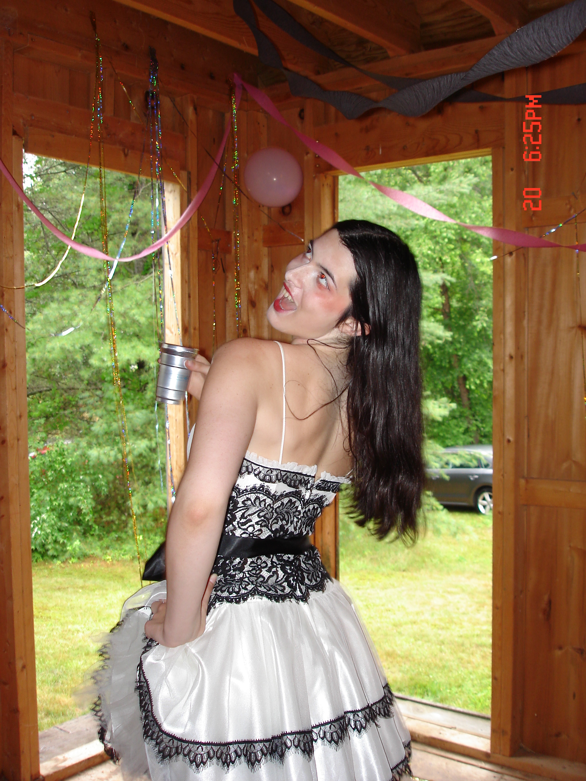 Picture of someone smiling in a barn.
